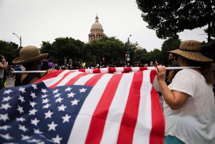 Protesters gather south of the Capitol building in Austin on Sunday, May 31, 2020.