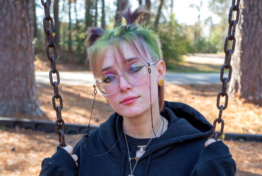 Georgia DeVries, 17, at a Lufkin-area park on Jan. 18, 2024. Teens in rural areas experiencing homelessness like DeVries face a dearth of services available in cities and often go uncounted.