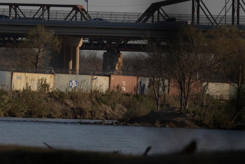 Shipping containers line the bank of the Rio Grande at Shelby Park in Eagle Pass, on Jan. 19, 2024.