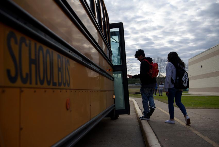 Students get onto a bus following classes at Lufkin High School in Lufkin on Jan. 27, 2023. Public school officials in rural areas like Lufkin face budget challenges because of proposed school choice legislation, which provides taxpayer-funded alternatives to sending a child to a local public school.