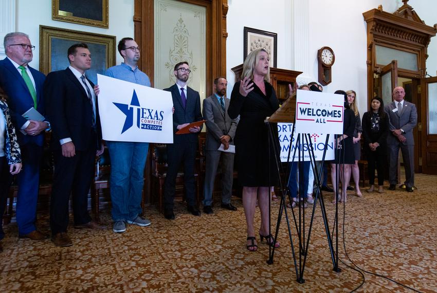 Angela Hale, executive director for Texas Welcomes All, speaks during a press conference on March 27, 2019.