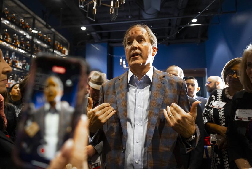 Texas Attorney General Ken Paxton speaks to attendees during a reception for Jared Woodfill at the Federal American Grill on Monday, Feb. 5, 2024, in Houston.