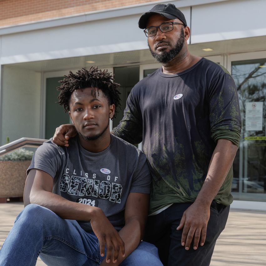 Senior at Mansfield High School and first time voter Jalan Henderson, 18, and his father Luther Henderson pose for a portrait after voting at the Tarrant County College Southeast Campus polling location in Arlington on primary election day, March 5, 2024.