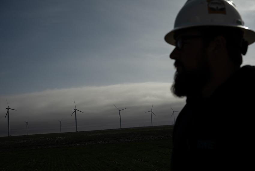 RWE Site Lead Justin Shaw poses for a photo Wednesday, March 6, 2024 in Roscoe. Shaw has moved his way up as a technician in the wind energy industry through multiple different companies and has seen a shift in culture and educational focus change around him.