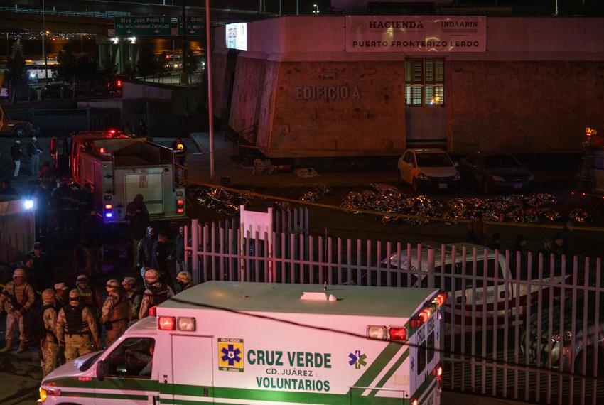 Bodies of those who died during the fire inside a Mexican detention facility were laid in a parking lot outside the offices of the National Migration Institute near the U.S.-Mexico border in Ciudad Juárez on March 27, 2023. The fire killed 40 immigrants and injured more than two dozen.