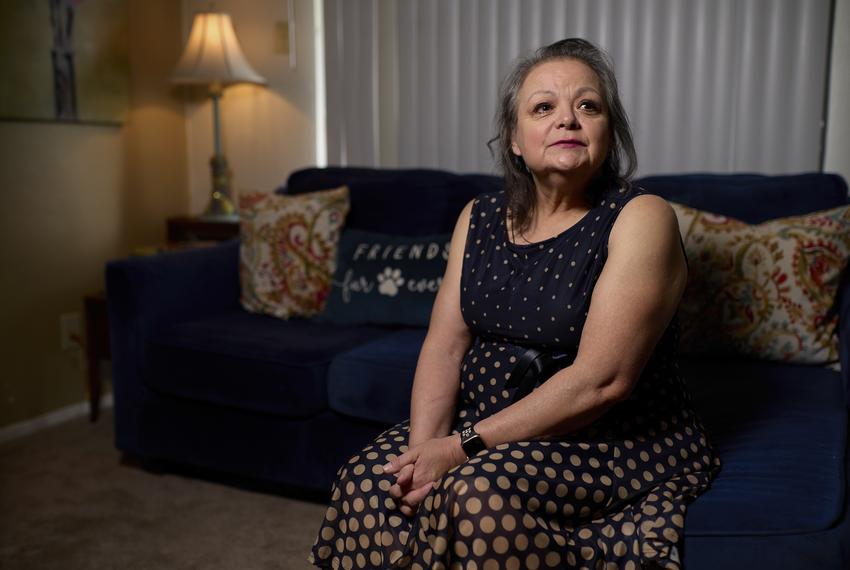 Mary Ann Estrella sits for a portrait inside her apartment in Midland, Texas, on April 20, 2024.