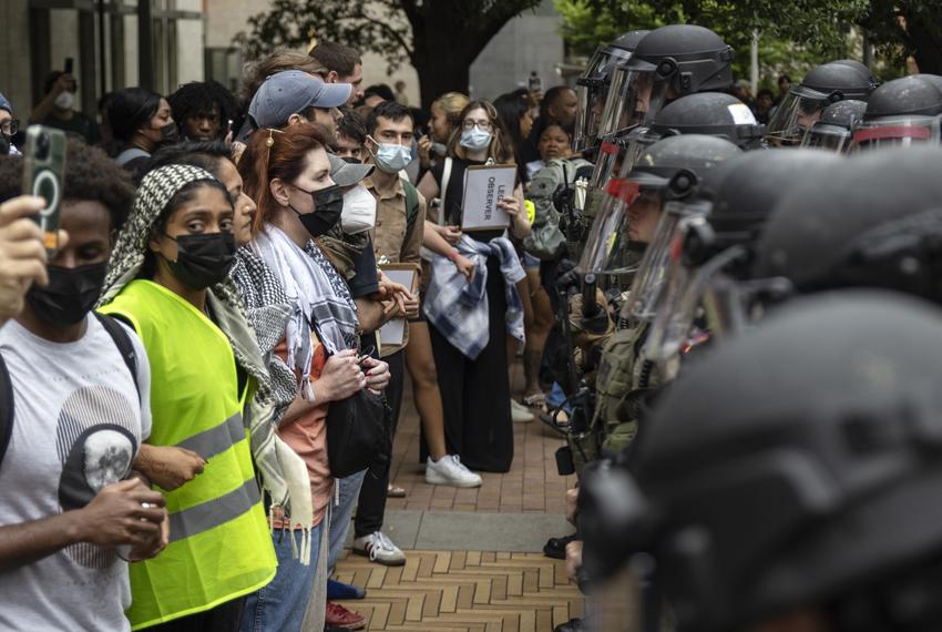 Protesters face a police line during a student demonstration in support of Palestine on the University of Texas campus Wednesday, April 24, 2024, in Austin.