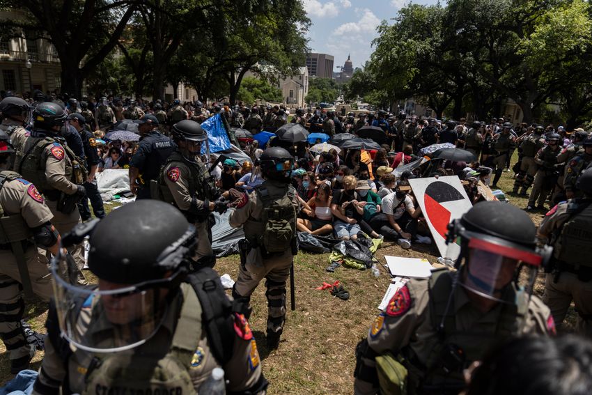 Texas department of Public Safety troopers surround a pro-Palestinian encampment on the University of Texas at Austin campus on Monday, April 29, 2024.