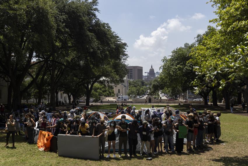 University of Texas at Austin students begin to form an encampment on the South Lawn of the University’s campus on Monday, April 29, 2024. Shortly after, law enforcement, including Texas Department of Public Safety troopers dressed in riot gear, arrived to forcefully remove the pro-Palestinian protesters.