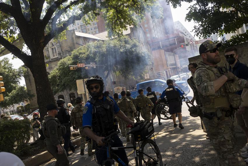 Law enforcement disperses a crowd at a pro-Palestine demonstration with flash bangs at the University of Texas Austin on Apr. 29, 2024.