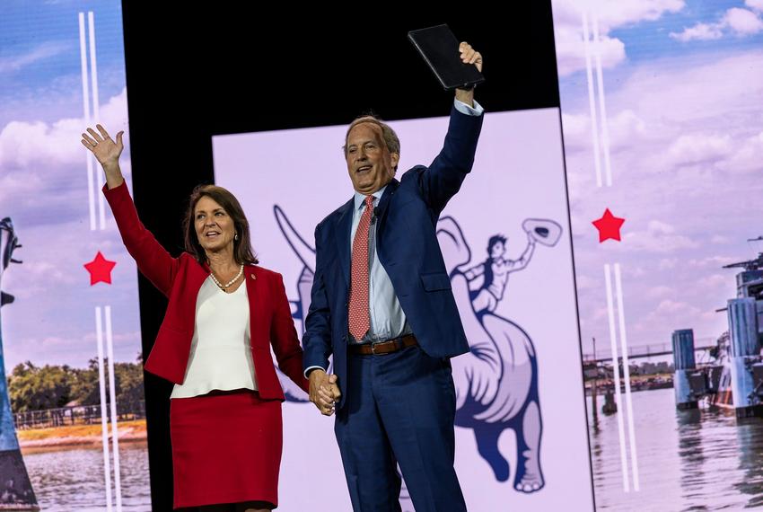 Texas Attorney General Ken Paxton and his wife Senator Angela Paxton wave to conventioneers during the Texas GOP Convention Thursday, May 23, 2024 in San Antonio.