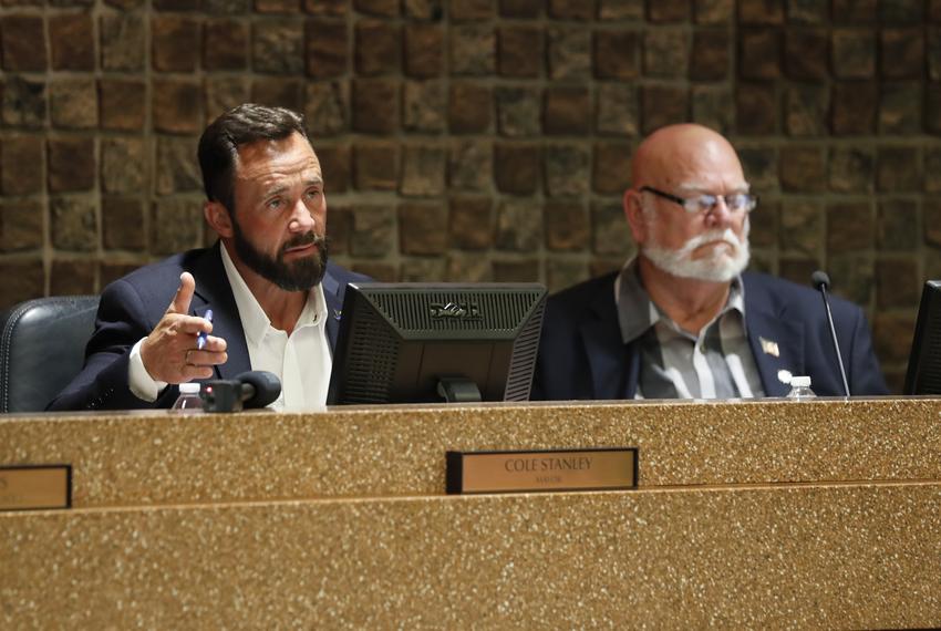 Amarillo Mayor Cole Stanley, left, and Councilman Tom Scherlen listen to testimony during a city council meeting Tuesday, May 28 in Amarillo. Residents gave testimony and arguments to members of the city council as they discussed a proposed abortion travel ban in Amarillo.
