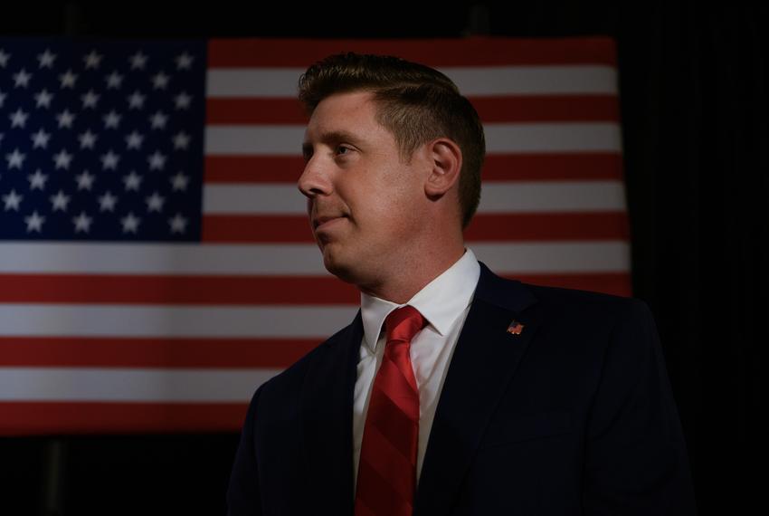 David Covey stands on stage as the crowd waits for results to come in during a watch party on election night at The Palms Event Center in Orange, Texas, US, on Tuesday, May 28, 2024. Covey is challenging Texas House Speaker Dade Phelan, whose ouster could turn up the far-right temperament of the already conservative Legislature.