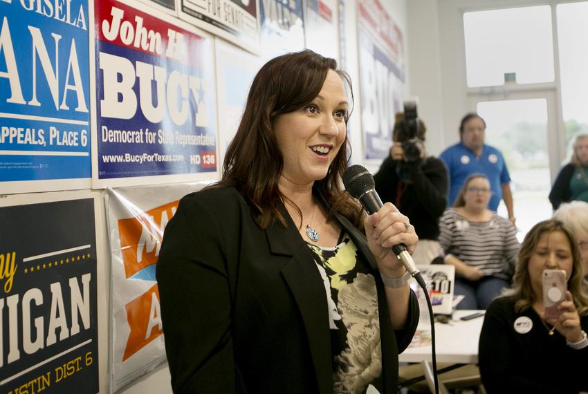 Democratic nominee for the 31st Texas congressional district, MJ Hegar speaks to supporters and volunteers at an early vote rally at her field office in Austin, Texas on October 25, 2018