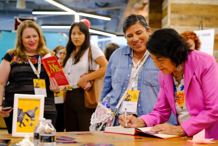 Dolores Huerta signs copies of the book "50 Years of Ms.: The Best of the Pathfinding Magazine that Ignited a Revolution" at the Capital Factory inside the Omni Voltron during The Texas Tribune Festival on Sept. 22, 2023 in Austin, TX.