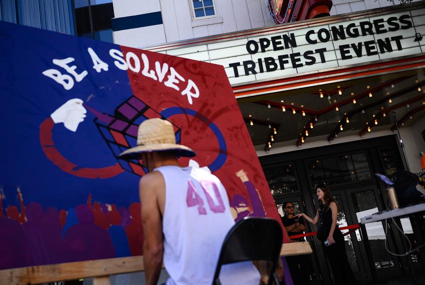 Artist Sean Allen, who goes by Aye!, paints in front of the Paramount Theatre during The Texas Tribune Festival’s Open Congress Saturday, Sept. 23, 2023 in Austin, Texas.