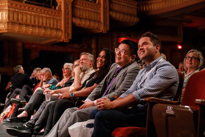 Audience members, including Texas Tribune Editor In Chief Sewell Chan, watch as Evan Smith and Sonal Shah speak with U.S. Senator Joe Manchin, D-West Virginia, about his agenda for America at The Texas Tribune Festival in Austin, TX on Sept. 23, 2023.