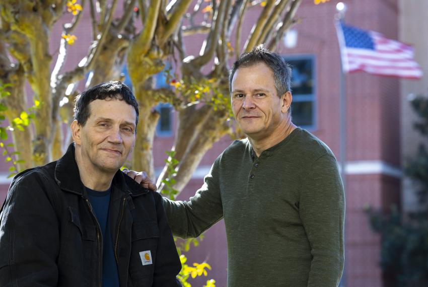 Thomas Smith, right, and his partner Kevin McCardle outside of the Polk County Courthouse building in Livingston on Thursday, Oct. 27, 2022. Smith has voted for mostly Republican candidates his entire life but will now be voting for Democrats this election as issues like women’s rights and same sex marriage are being scrutinized.