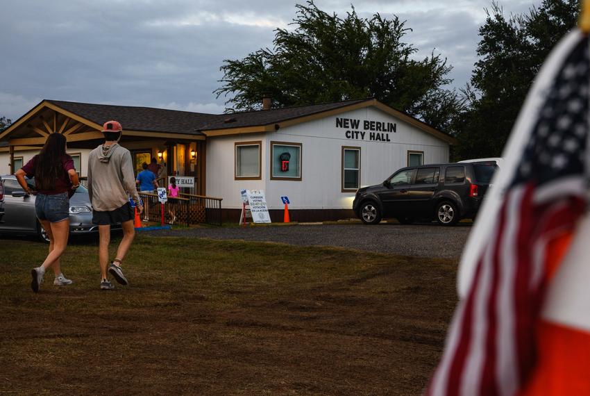 Voters walk up to the New Berlin City Hall voting center to cast their vote on Election Day Tuesday, Nov. 8, 2022, in New Berlin, Texas.