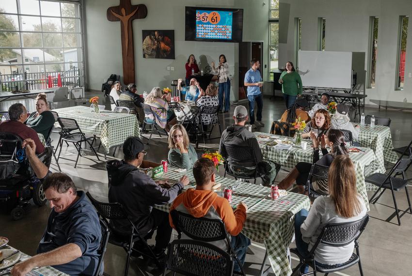 Residents playing bingo at Community First! Village, which aspires to be a model of permanent affordable housing for people who are chronically homeless.