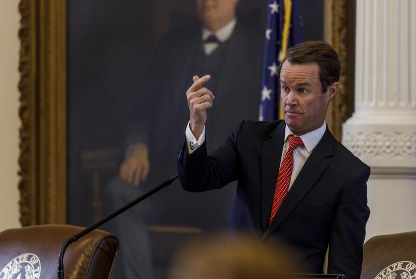 House Speaker Dade Phelan beckons at another member of the House during a special legislative session at the state Capitol in Austin on Nov. 17, 2023.