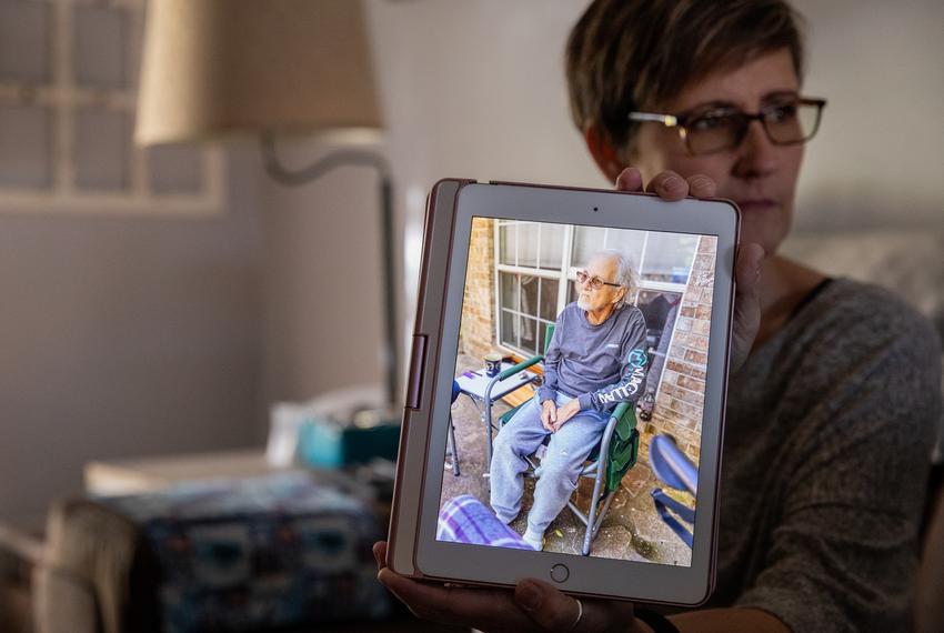 Michelle Simington shows a photo of her father in law before he passed away at 71. By the time Mike learned he had prostate cancer, it had spread to his bones.