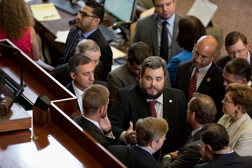 Huddle with Rep. Jonathan Stickland R-Bedford at the center on August 3, 2017