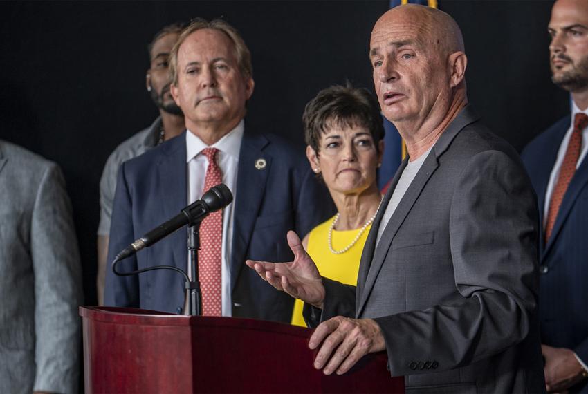 Kenny Hansmire, President of the American Football Coaches Foundation speaks during a news conference at the William P. Clements State Office Building on a pilot program to dispose of medications, especially opioids on Wednesday, Oct. 13, 2022 in Austin, TX. Paxton was joined by a group of former athletes and coaches to make the announcement. (Sergio Flores for The Texas Tribune)