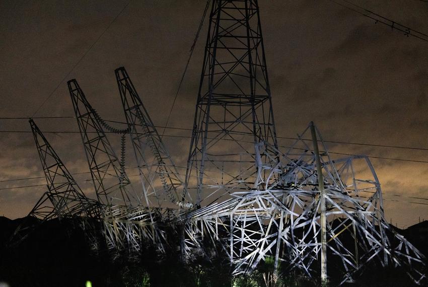 Thursday evening storms smashed several transmission power lines near Highway 99 on May 16, 2024, in Cypress. (Marie D. De Jesús / Houston Landing)