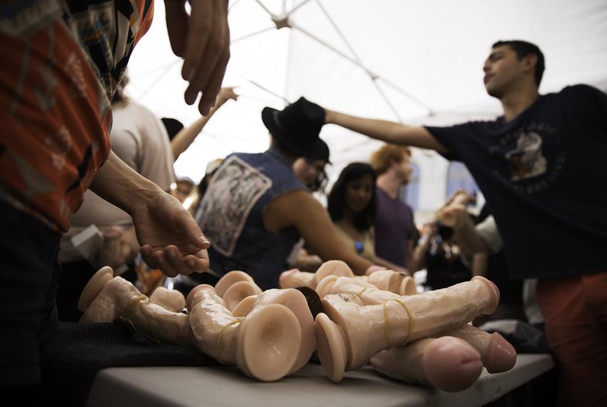 UT-Austin organizers pass out dildos to students for the Cocks Not Glocks movement in protest of newly enacted campus carry law on August 23, 2016.