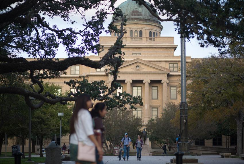 Students walking around the Texas A&M University campus in College Station.