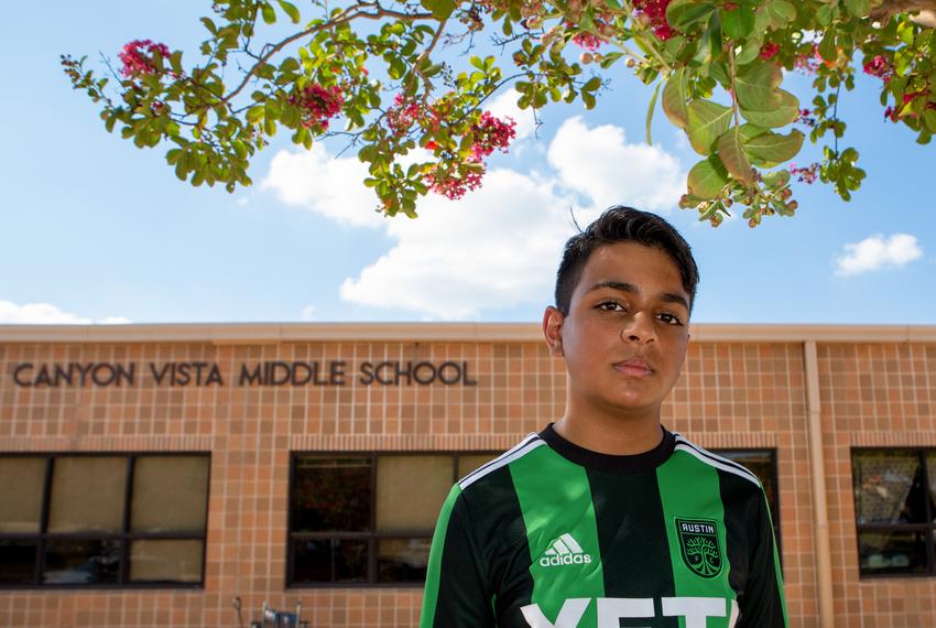 Round Rock ISD student Ayaan Moledina, 13, stands outside of Canyon Vista middle school. Moledina testified for more Asian American inclusion and accurate representation of Muslim Americans. Sept. 14, 2022.