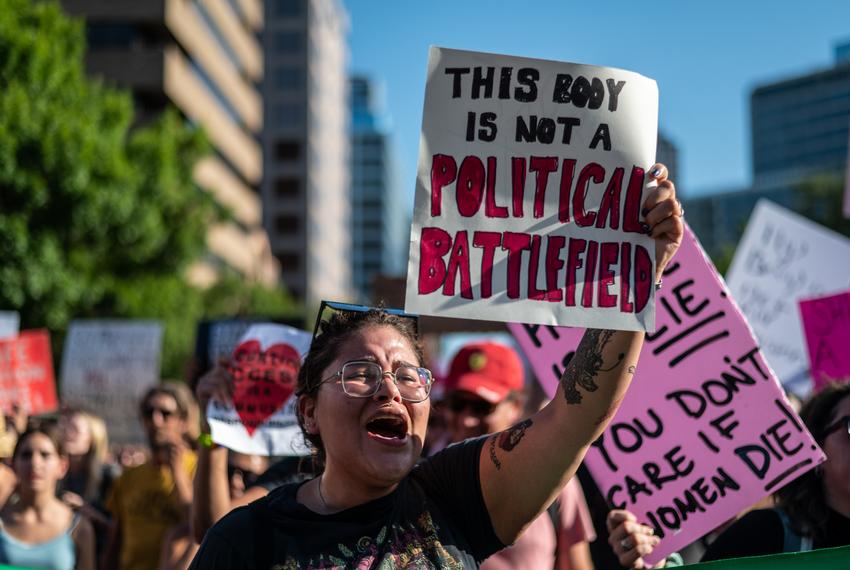 Protesters chant on Congress Ave. in front of the Texas State Capitol building at a pro-choice rally Friday, June 24, 2022 in Austin, TX. The Supreme Court overturned Roe V Wade Friday leading to national protests in response from pro abortion advocates. The announcement of the overturning would trigger an immediate ban on abortions in several states, including Texas. Sergio Flores for The Texas Tribune