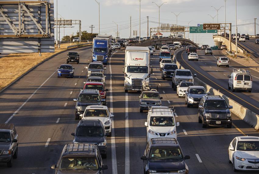 Rush hour traffic passes by on Interstate 35 through downtown Austin on the evening of Sept. 7, 2023.