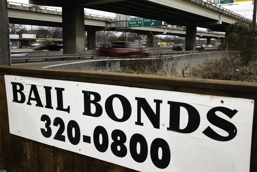 An Austin Bail Bonds II sign near Interstate 35 on Feb. 5, 2021.