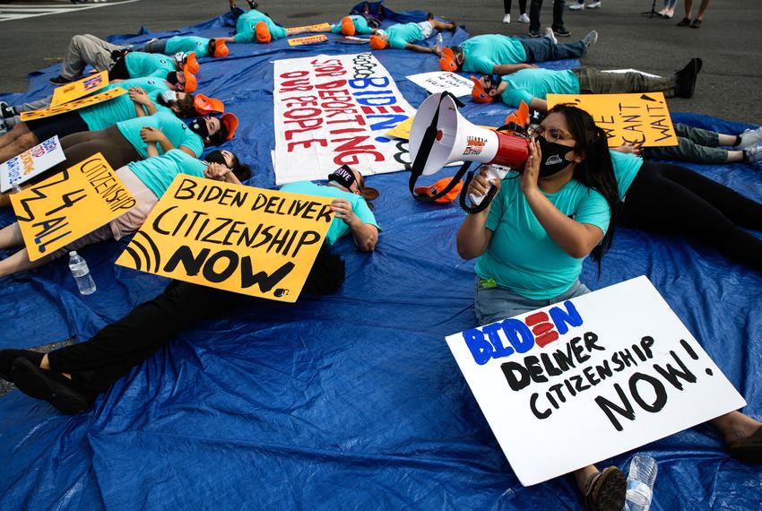 A DACA recipient spoke during a sit-in for immigration reform in the middle of Washington, D.C.'s Constitution Avenue on April 28, 2021. United We Dream, the nation's largest immigrant youth advocacy group, demanded President Joe Biden halt all deportations, end border detentions and deliver a broad pathway to citizenship on the eve of his hundredth day in office.