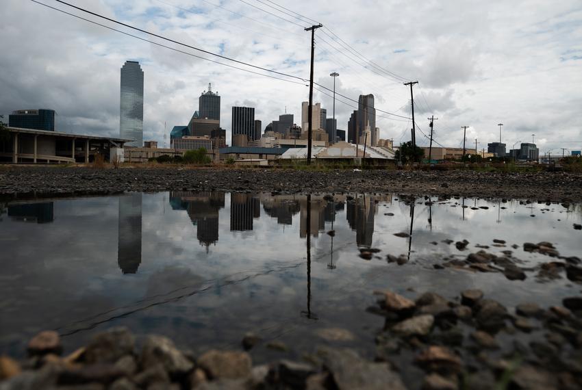 A undeveloped portion of land near a site for bullet train tracks and pedestrian bridges for the proposed bullet train terminus near downtown Dallas, on Thursday, Aug. 25, 2022. The entities in charge of a bullet train connection between Houston and DFW have faded despite Texas courts approving eminent domain to accomplish the massive project.