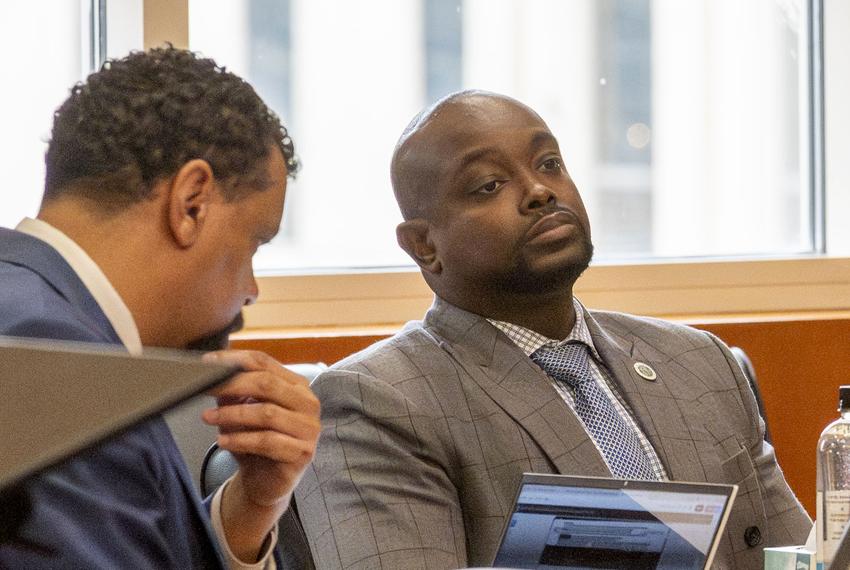 180th District Court Judge DaSean Jones, right, with his attorney at the Harris County Civil Courthouse on April 1, 2024.