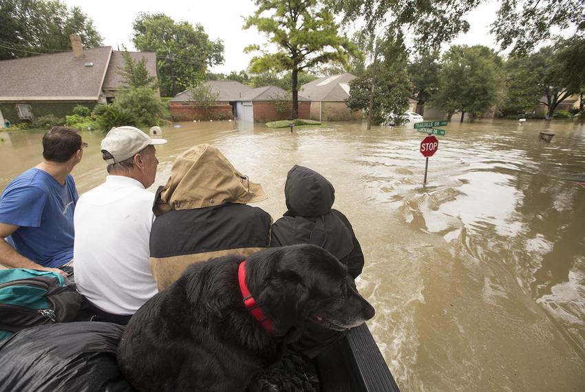 A load of evacuees in the back of Chris Ginter's monster truck in Houston on Tuesday, Aug 29, 2017. Ginter helped evacuate people from their flooded neighborhood near the Buffalo Bayou.