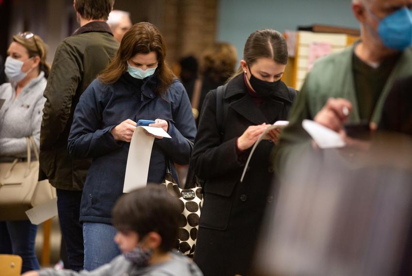 Voters wait in line at the Lakewood Branch Library in Dallas on Feb. 25, 2022, the last day of early voting in the Texas primary. Dallas County voting centers’ hours were extended till 10 P.M. on the last day of early voting to make up for early closures due to icy weather.