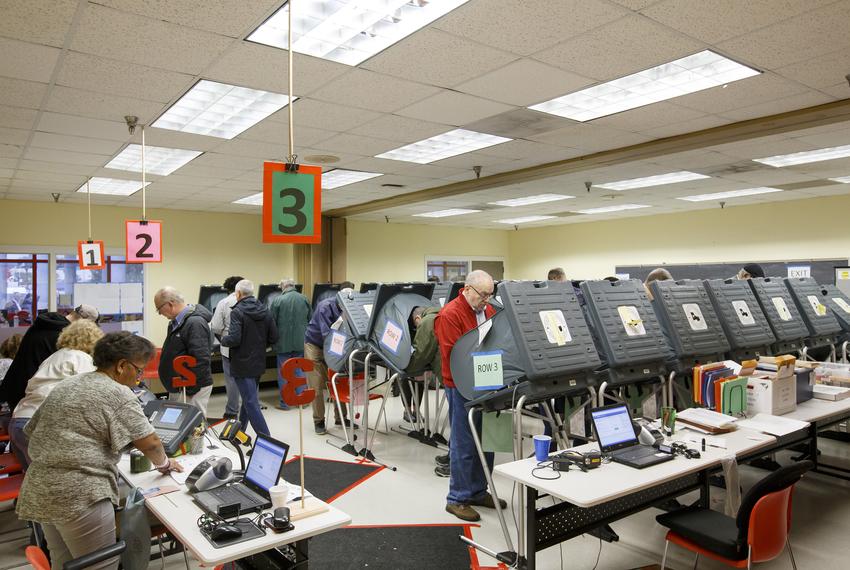 Texans cast their votes at the start of early voting at the Metropolitan Multi-Service Center near downtown Houston on Monday, Oct. 22, 2018.