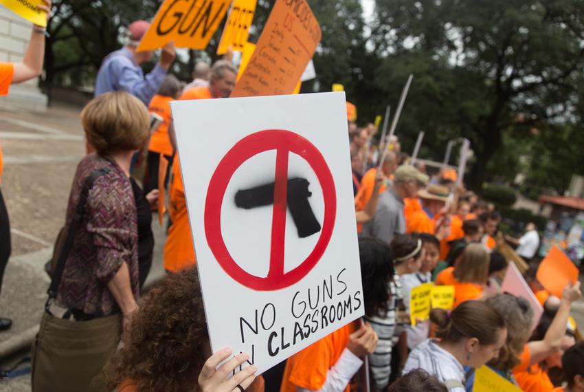 On Nov. 10, University of Texas at Austin faculty and students protest Senate Bill 11, which will allow people with concealed handgun licenses to pack heat in campus buildings. The law allows private schools to opt out and empowers university administrators to set their own rules and declare some parts of campus "gun free zones."