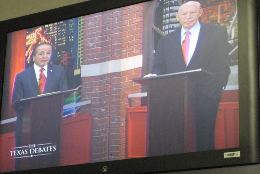 The Democratic candidates on screen at their primary debate.