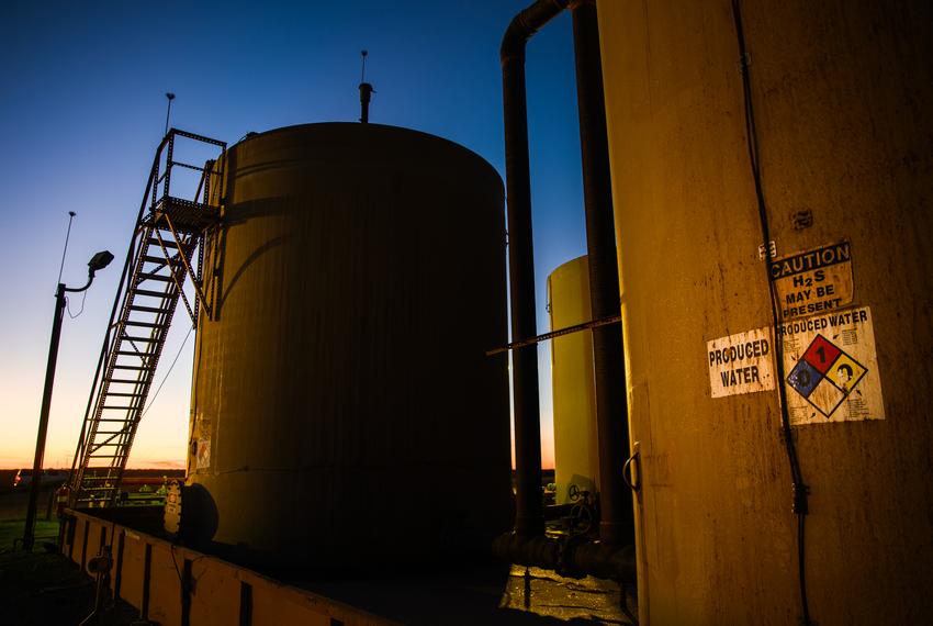 A produced water tank sits as part of a tank battery at an injection well site Monday, Jan. 31, 2022 outside of Odessa. The injection facility is located less than two miles from a new suburban development north of Odessa.