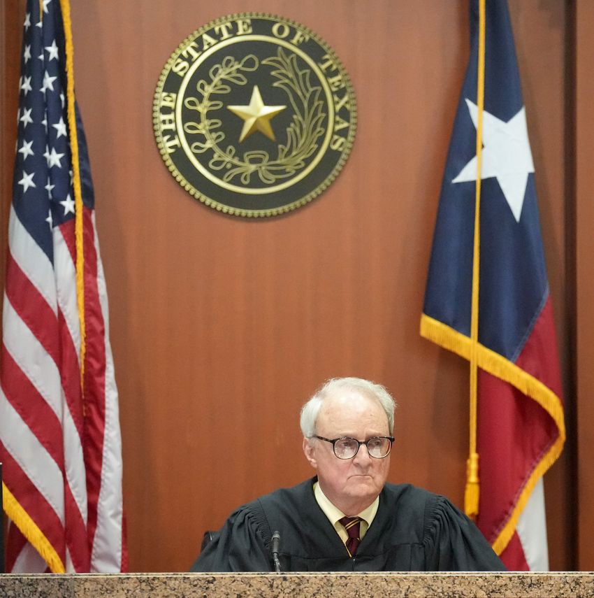 Judge David Peeples, a visiting judge from Bexar County prepares to listen to arguments for a hearing about the November 2022 Harris County elections at Harris County Civil Courthouse on Tuesday, Aug. 1, 2023 in Houston.