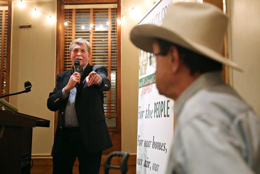 Former state Rep. Lon Burnam, a candidate for the Texas Railroad Commision, thanks Jim Hightower at his campaign kickoff at Scholz Garten on January 28, 2016.