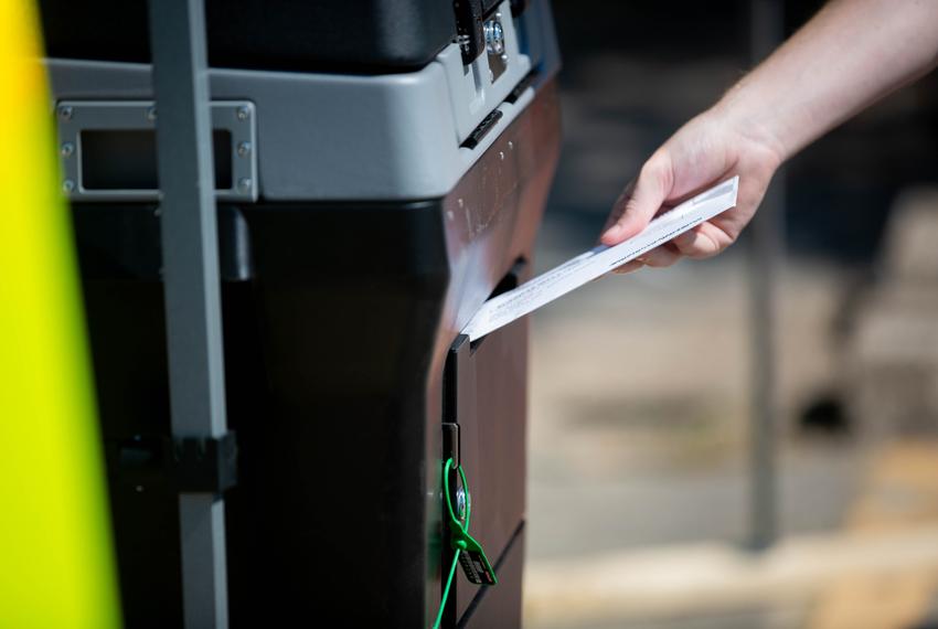 The Travis County Tax Office at 5501 Airport Blvd is now the only drive-thru location open for hand delivery of mail ballots in the county. The drop-off location photographed here on Oct. 2, 2020, will be open until Nov. 3, 2020.