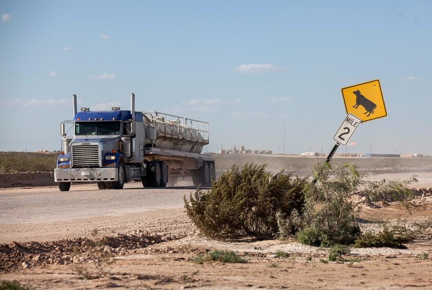 A semi-truck near an oil rig site outside of Mentone on Oct. 12, 2014.