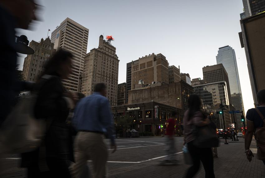 Pedestrians walk through downtown Dallas on Nov. 07, 2023.