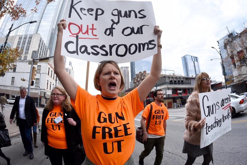 Stephanie Odam of Austin marches in a campus carry protest in Austin, Jan 8, 2015.